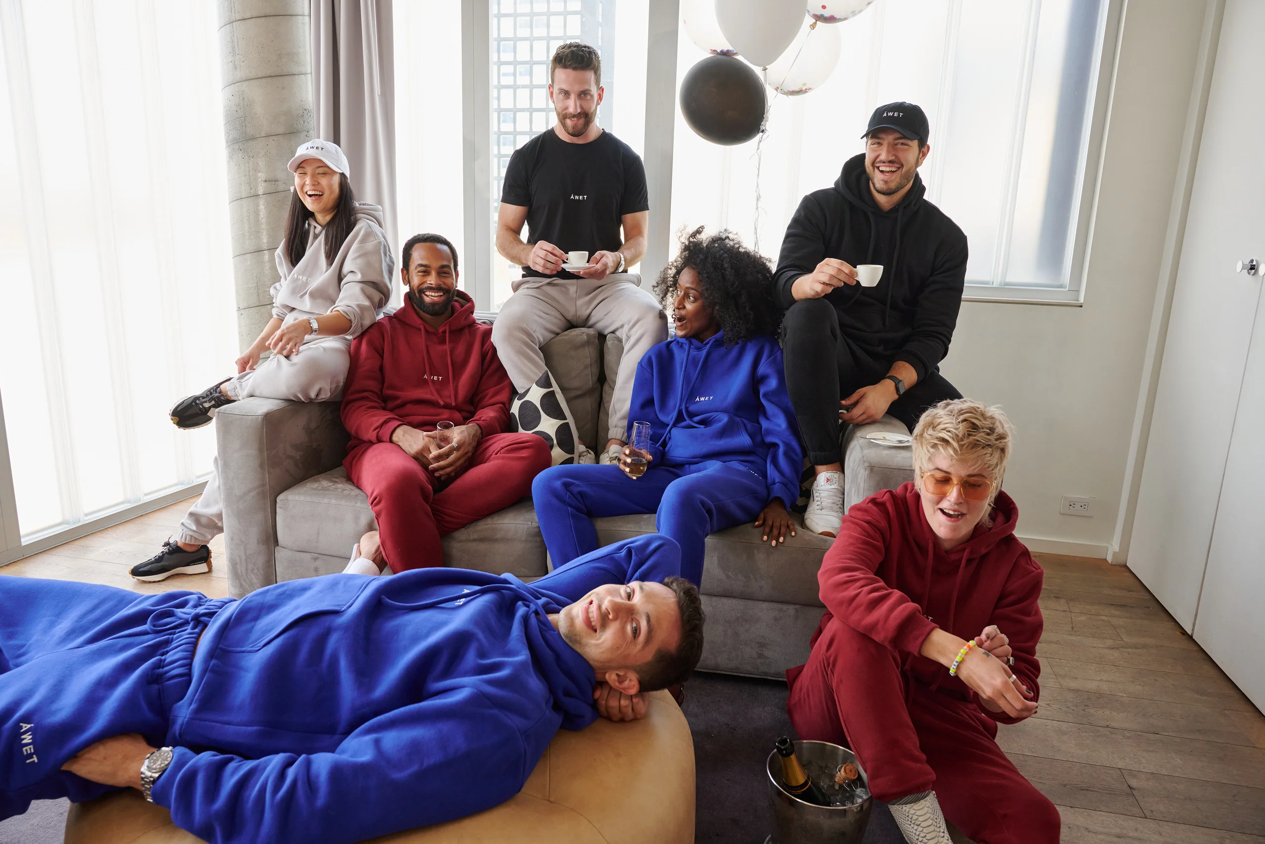 ÁWET New York group portrait by Erika Barker, credited in Vogue’s launch feature.